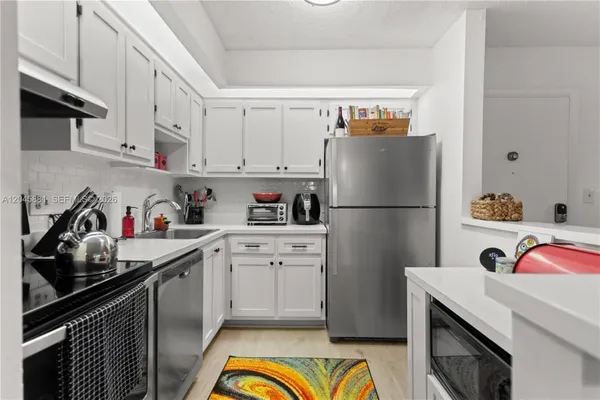 Property Slideshow image 2 of 65 | 9930 s belfort cir 105, Tamarac, FL, 33321