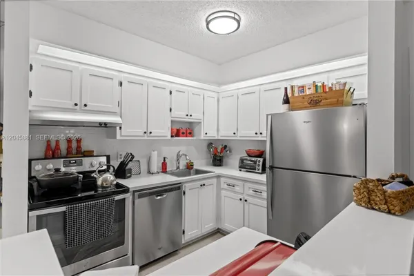 Property Slideshow image 3 of 65 | 9930 s belfort cir 105, Tamarac, FL, 33321