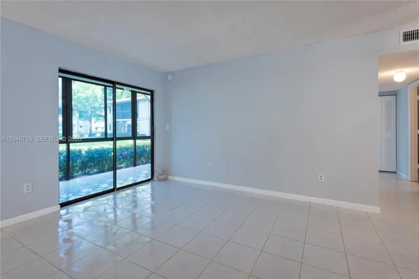 Property Slideshow image 3 of 23 | 10789 w clairmont cir 107, Tamarac, FL, 33321