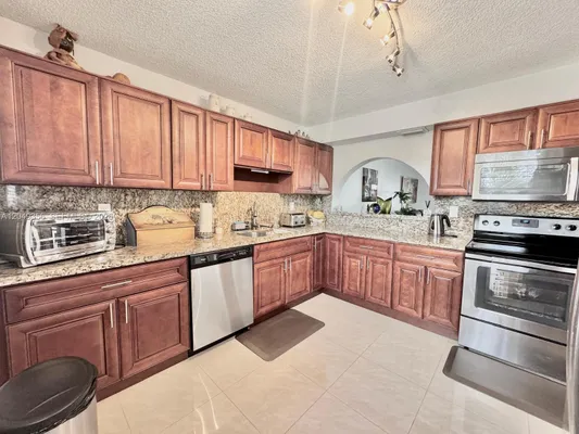 Property Slideshow image 2 of 29 | 4975 e sabal palm blvd 311, Tamarac, FL, 33319