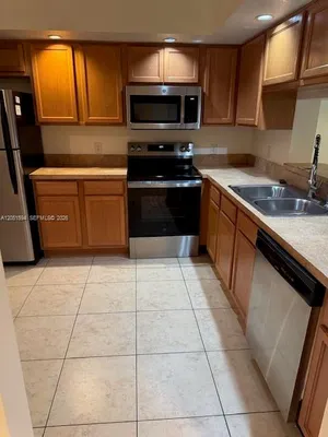 Property Slideshow image 2 of 18 | 100 sw 130th ter 308c, Pembroke Pines, FL, 33027