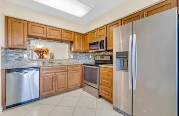 7290 KINGHURST DR APT 406, DELRAY BEACH,..., Delray Beach, FL 33446