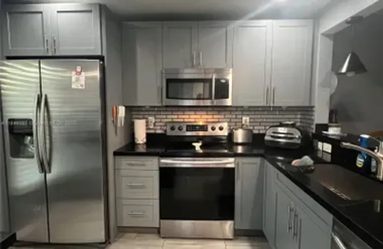 5830 NW 64TH AVE APT 103, TAMARAC, FL, 3..., Tamarac, FL 33319