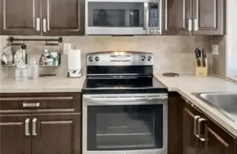 9301 LIME BAY BLVD APT 105, TAMARAC, FL,..., Tamarac, FL 33321