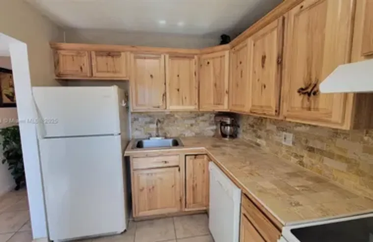 5851 NW 62ND AVE APT 202, TAMARAC, FL, 3..., Tamarac, FL 33319