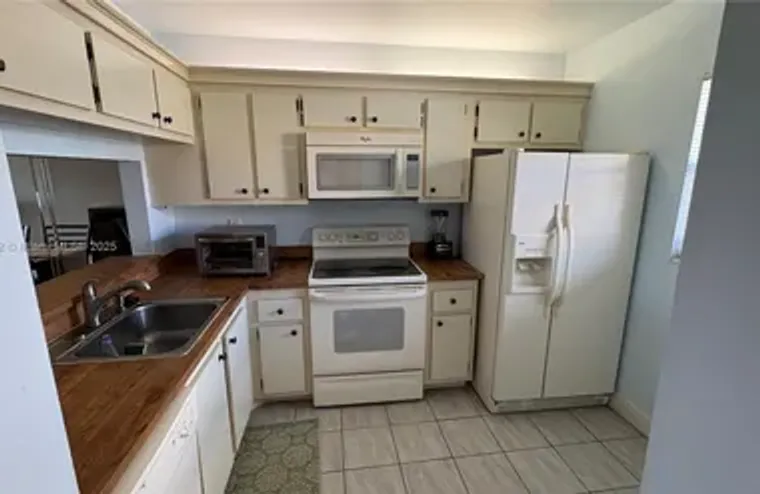 7118 GOLF COLONY CT APT 103, LAKE WORTH,..., Lake Worth, FL 33467