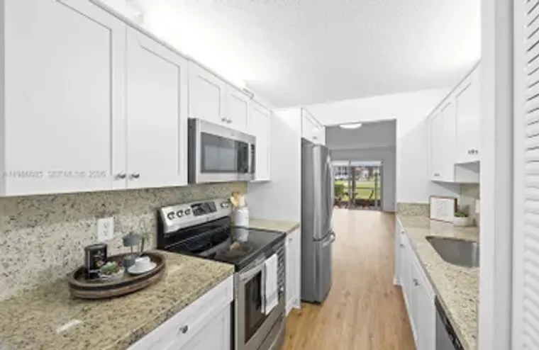 1401 SW 128TH TER 103H, PEMBROKE PINES, ..., Pembroke Pines, FL 33027