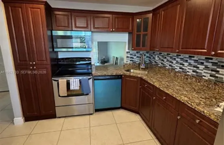 6095 N SABAL PALM BLVD APT 104, TAMARAC,..., Tamarac, FL 33319