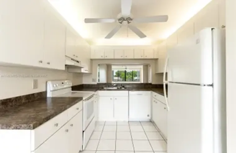 9455 N BELFORT CIR 211, TAMARAC, FL, 333..., Tamarac, FL 33321