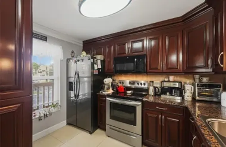 5750 NW 64TH AVE APT 211, TAMARAC, FL, 3..., Tamarac, FL 33319