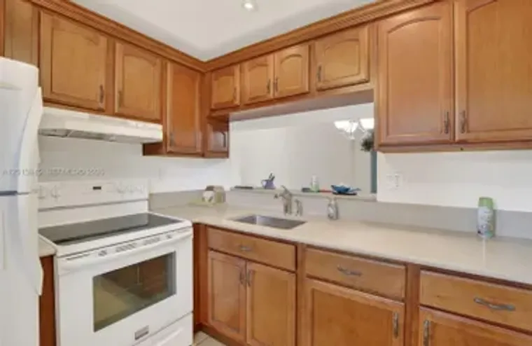9090 LIME BAY BLVD 203, TAMARAC, FL, 333..., Tamarac, FL 33321