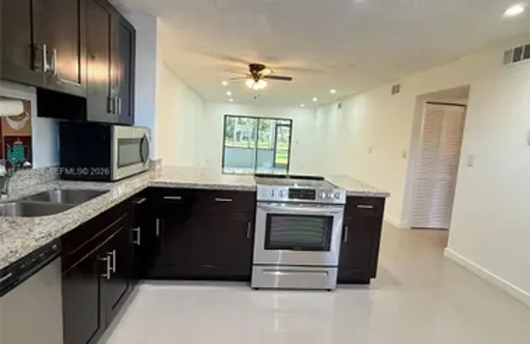 6095 N SABAL PALM BLVD 103, TAMARAC, FL,..., Tamarac, FL 33319