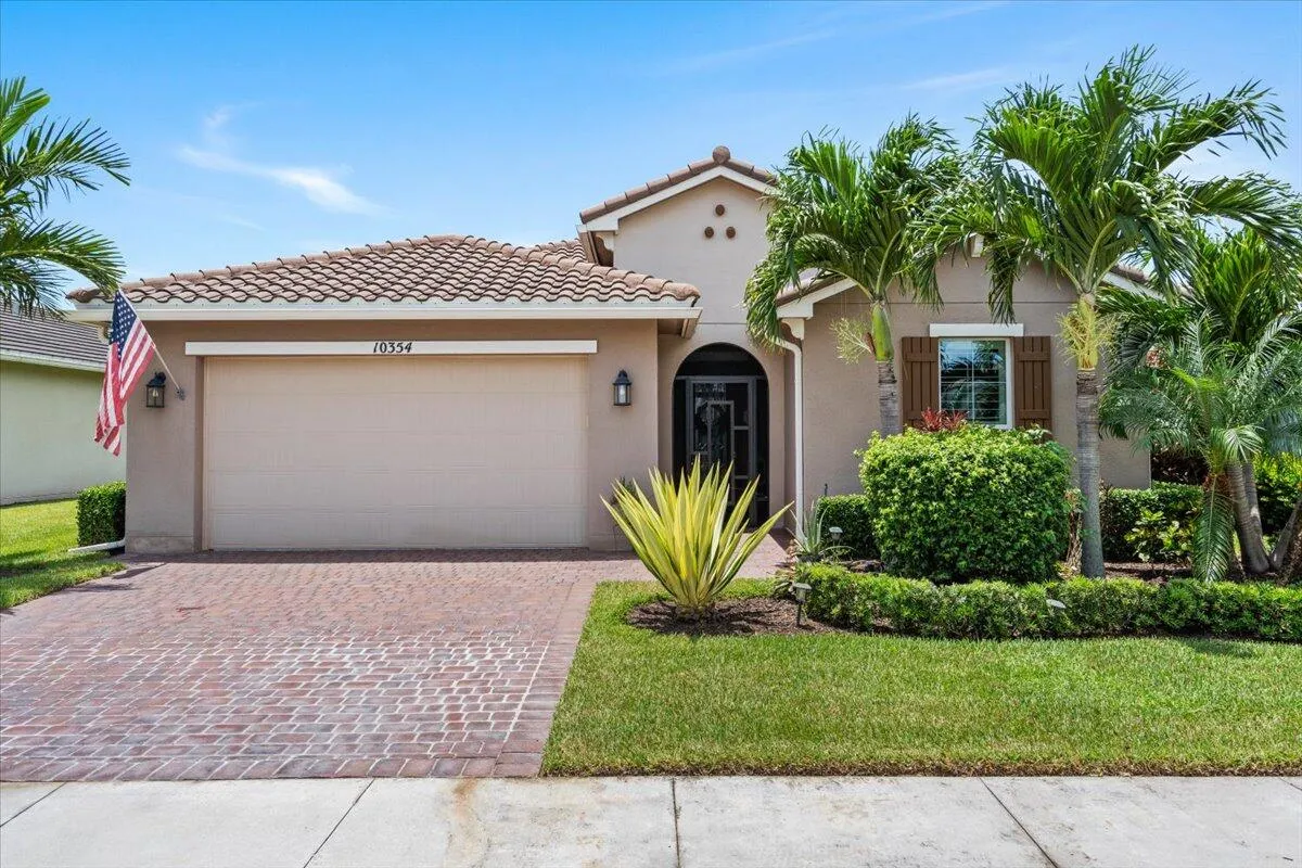 Property Slideshow image 1 of 71 | 10354 sw ligustrum dr, Port Saint Lucie, FL, 34987