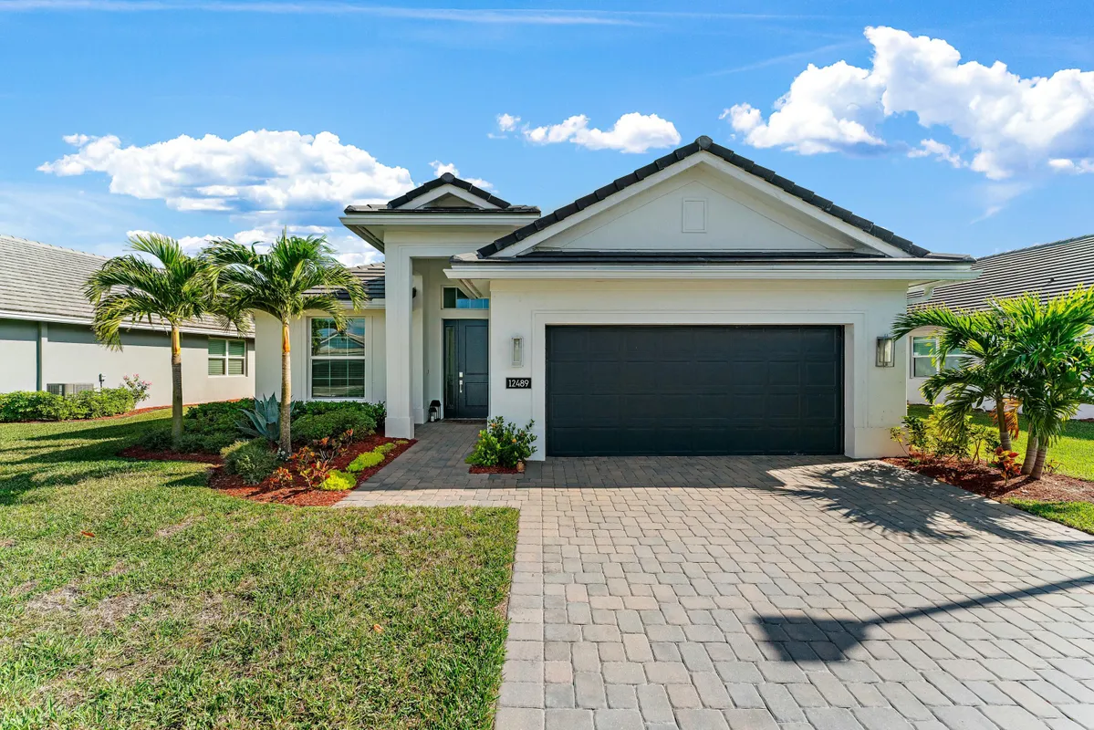 Property Slideshow image 1 of 62 | 12489 sw sunrise lake ter, Port Saint Lucie, FL, 34987