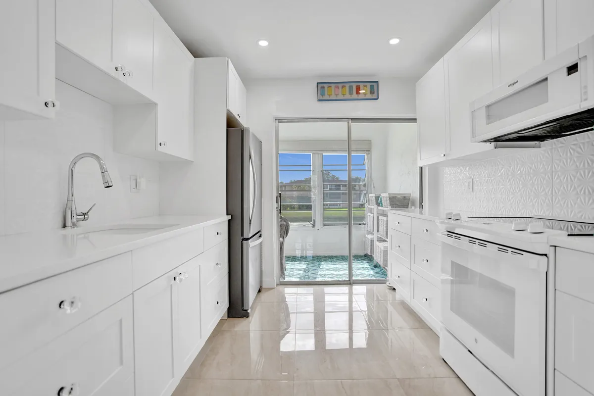 Property Slideshow image 1 of 69 | 32 abbey ln 205, Delray Beach, FL, 33446