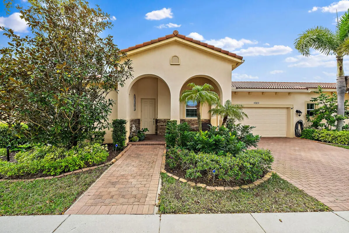 Property Slideshow image 1 of 34 | 10211 sw reggiani rd, Port Saint Lucie, FL, 34986
