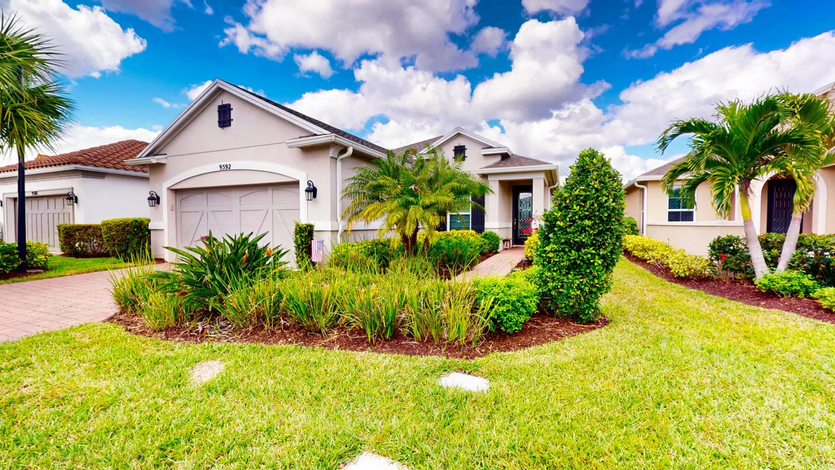 Property Slideshow image 1 of 57 | 9592 sw royal poinciana dr, Port Saint Lucie, FL, 34987