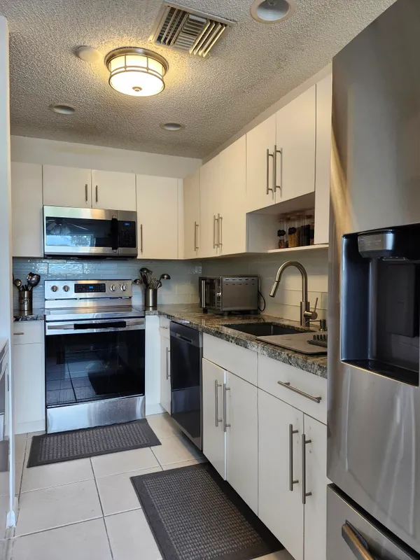 Property Slideshow image 1 of 21 | 1141 calamondin ter apt 101, Delray Beach, FL, 33445