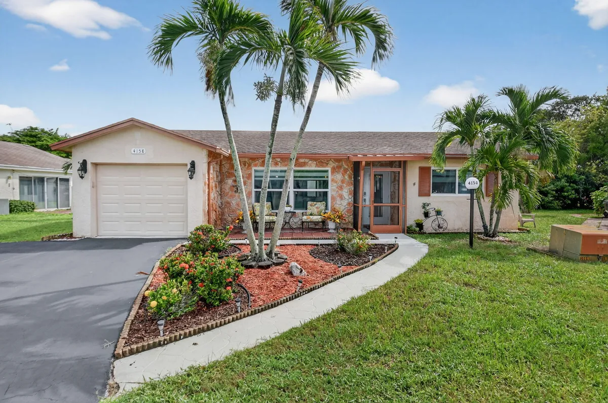 Property Slideshow image 1 of 48 | 4158 pine aire dr, Lake Worth, FL, 33467