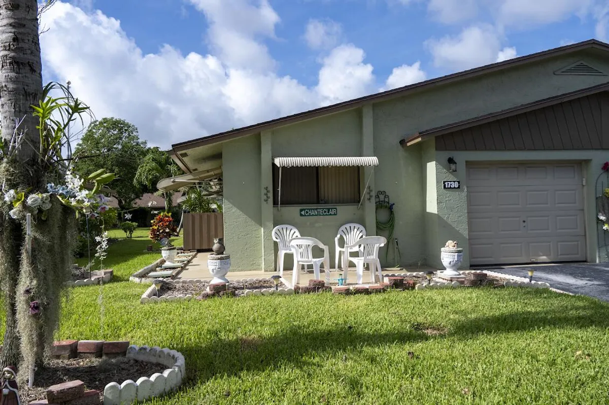Property Slideshow image 1 of 14 | 1730 palmland dr, Boynton Beach, FL, 33436