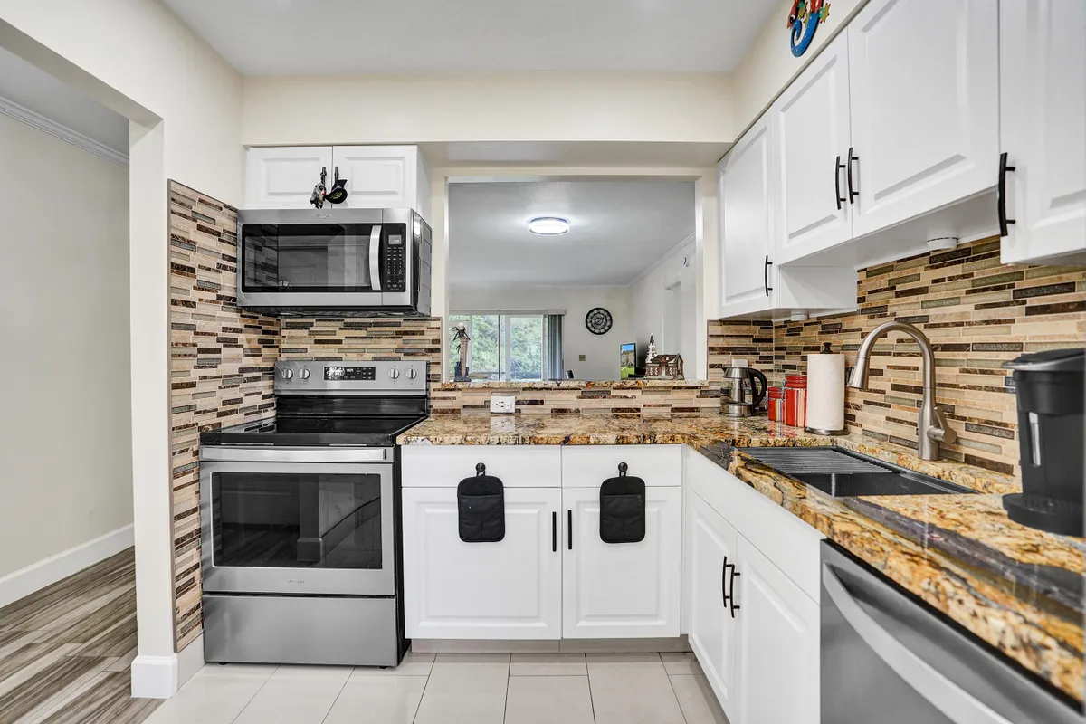 Property Slideshow image 1 of 64 | 140 lake meryl dr apt 140, West Palm Beach, FL, 33411
