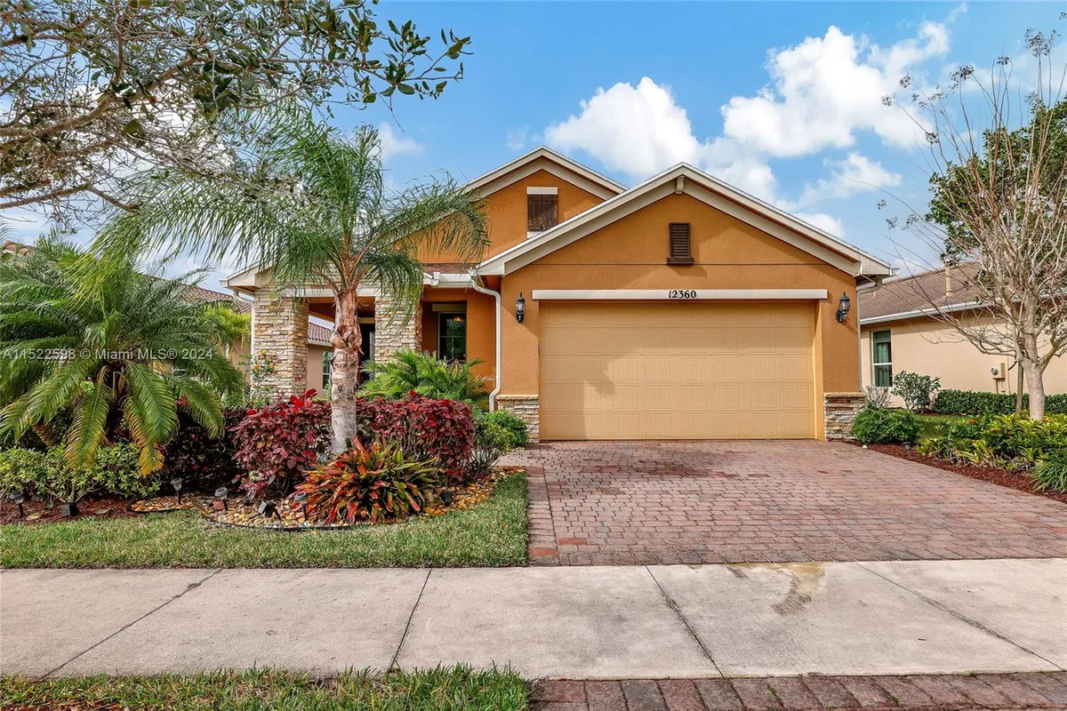 Property Slideshow image 1 of 61 | 12360 sw weeping willow ave, Port St Lucie, FL, 34987