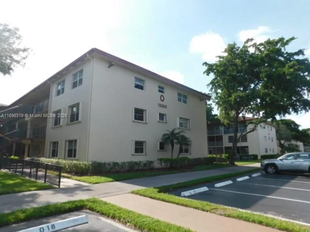 Property Slideshow image 1 of 30 | 13300 sw 1st st apt 112o, Pembroke Pines, FL, 33027