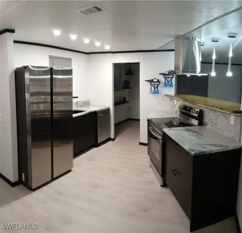 Property Slideshow image 1 of 38 | 5502 ben franklin ln, North Fort Myers, FL, 33917