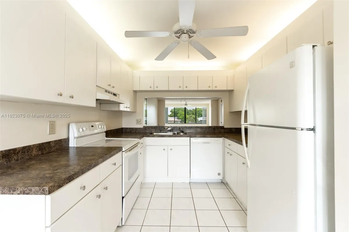 Property Slideshow image 1 of 26 | 9455 n belfort cir 211, Tamarac, FL, 33321