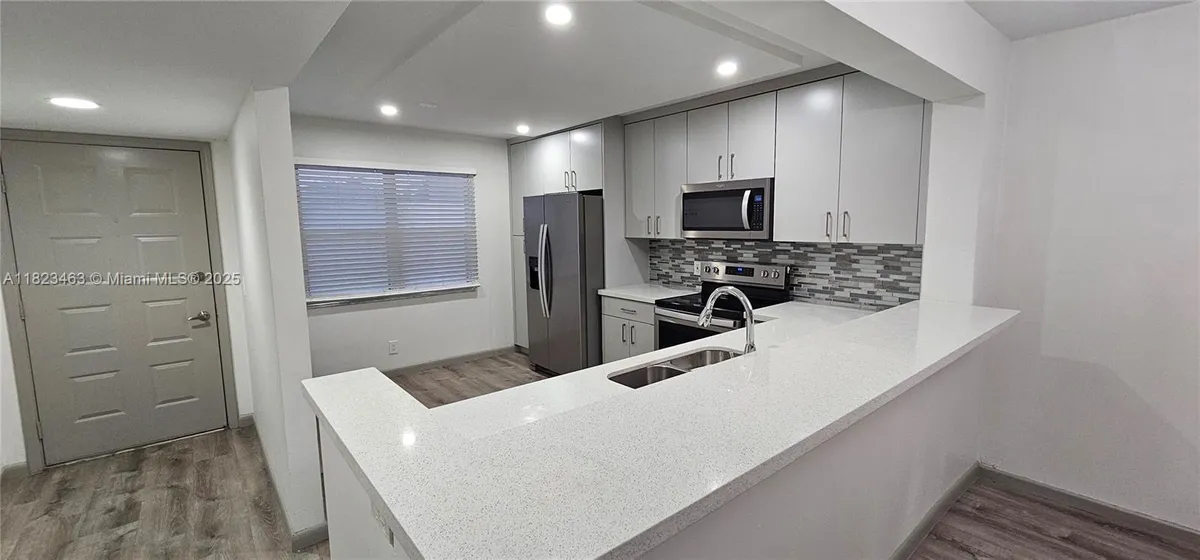 Property Slideshow image 1 of 22 | 100 sw 130th ter 309c, Pembroke Pines, FL, 33027