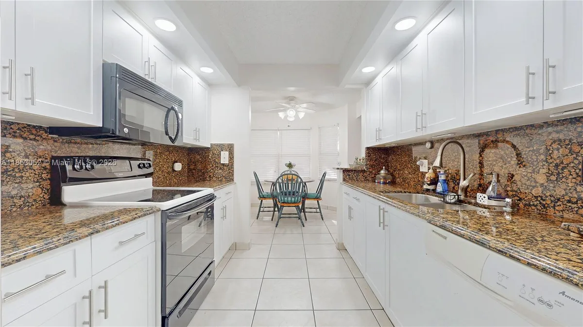 Property Slideshow image 1 of 49 | 550 sw 137th ave l104, Pembroke Pines, FL, 33027