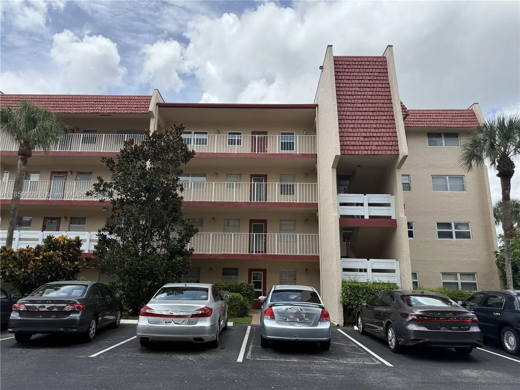 Property Slideshow image 1 of 22 | 1035 country club dr 208, Margate, FL, 33063