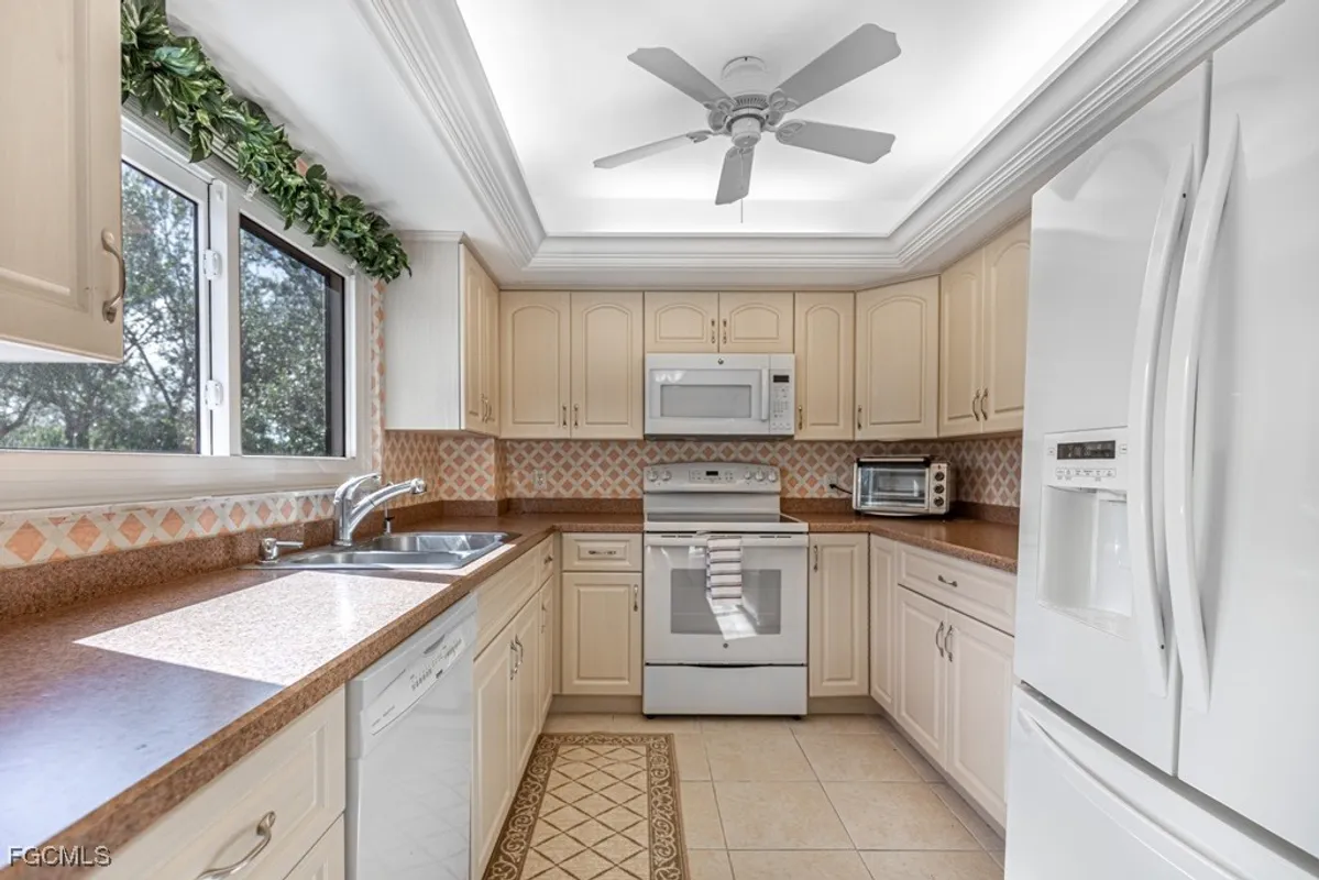 Property Slideshow image 1 of 45 | 7402 lake breeze dr 306, Fort Myers, FL, 33907