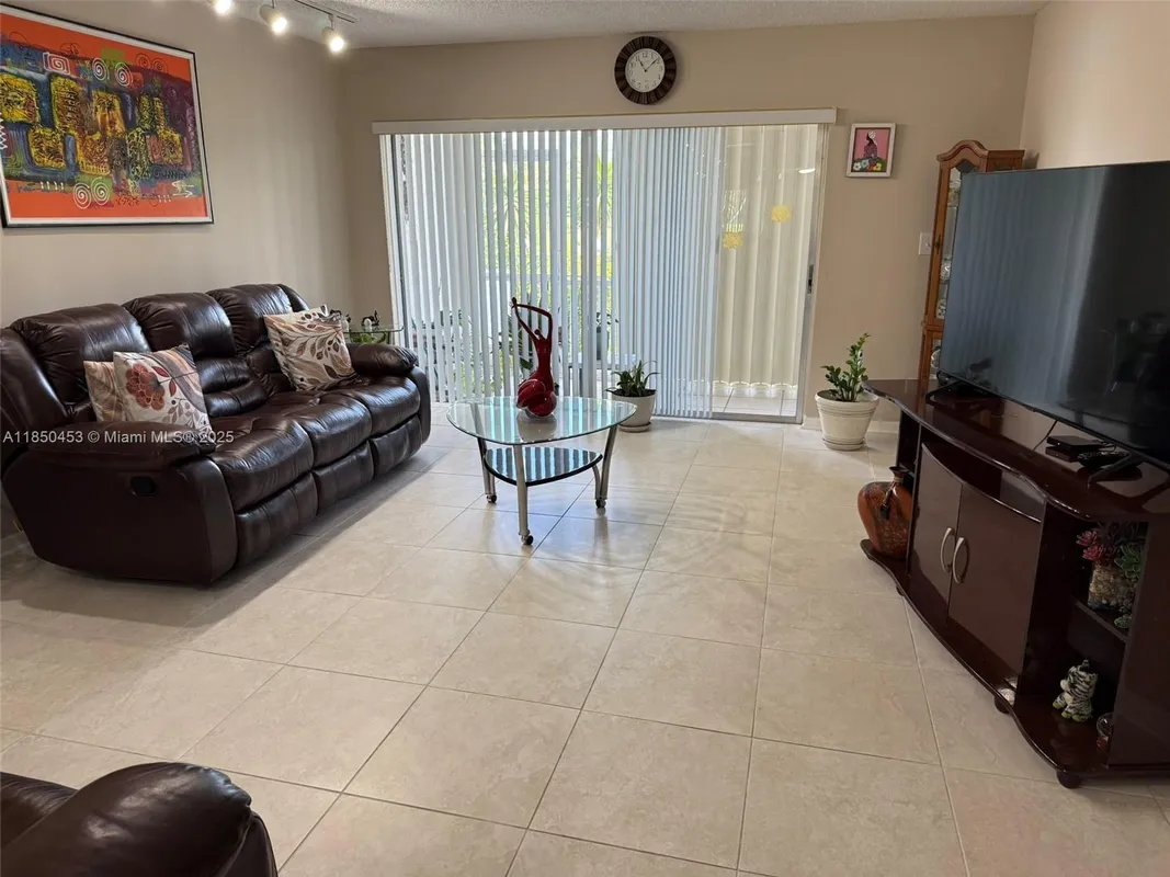Property Slideshow image 1 of 43 | 3581 inverrary dr 108, Lauderhill, FL, 33319