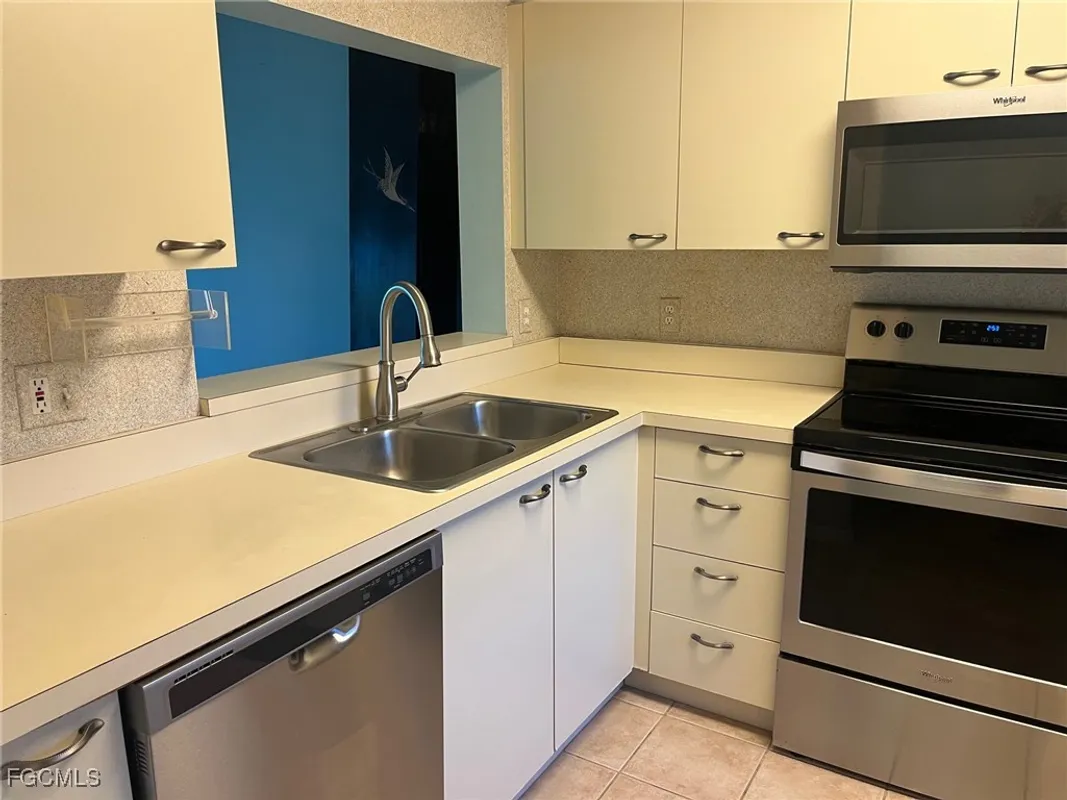 Property Slideshow image 1 of 37 | 7406 lake breeze dr 118, Fort Myers, FL, 33907