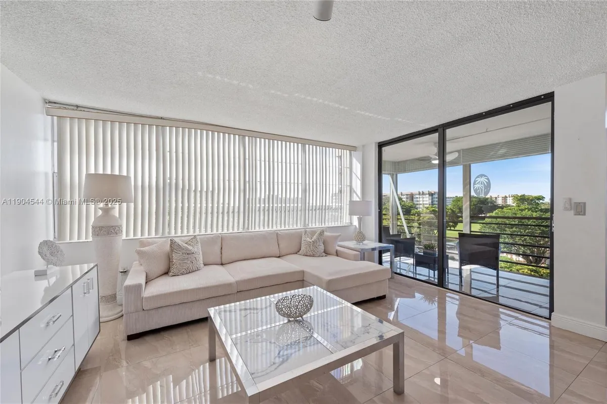 Property Slideshow image 1 of 18 | 1400 saint charles pl 520, Pembroke Pines, FL, 33026