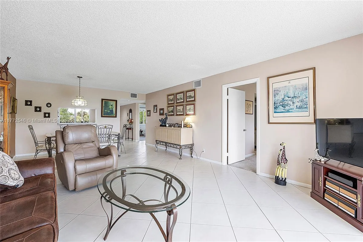 Property Slideshow image 1 of 57 | 12750 sw 4th ct 407j, Pembroke Pines, FL, 33027