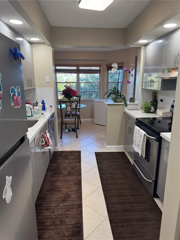 Property Slideshow image 1 of 47 | 12650 sw 6th st 411k, Pembroke Pines, FL, 33027