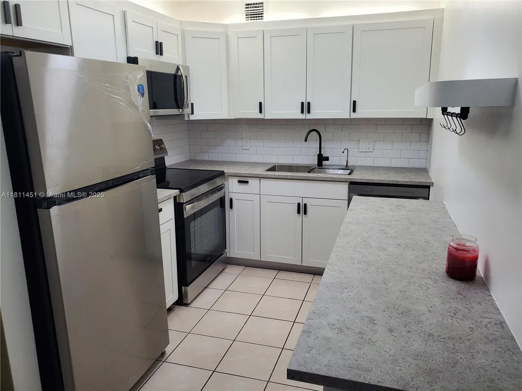 Property Slideshow image 1 of 29 | 800 sw 131st ave 113f, Pembroke Pines, FL, 33027