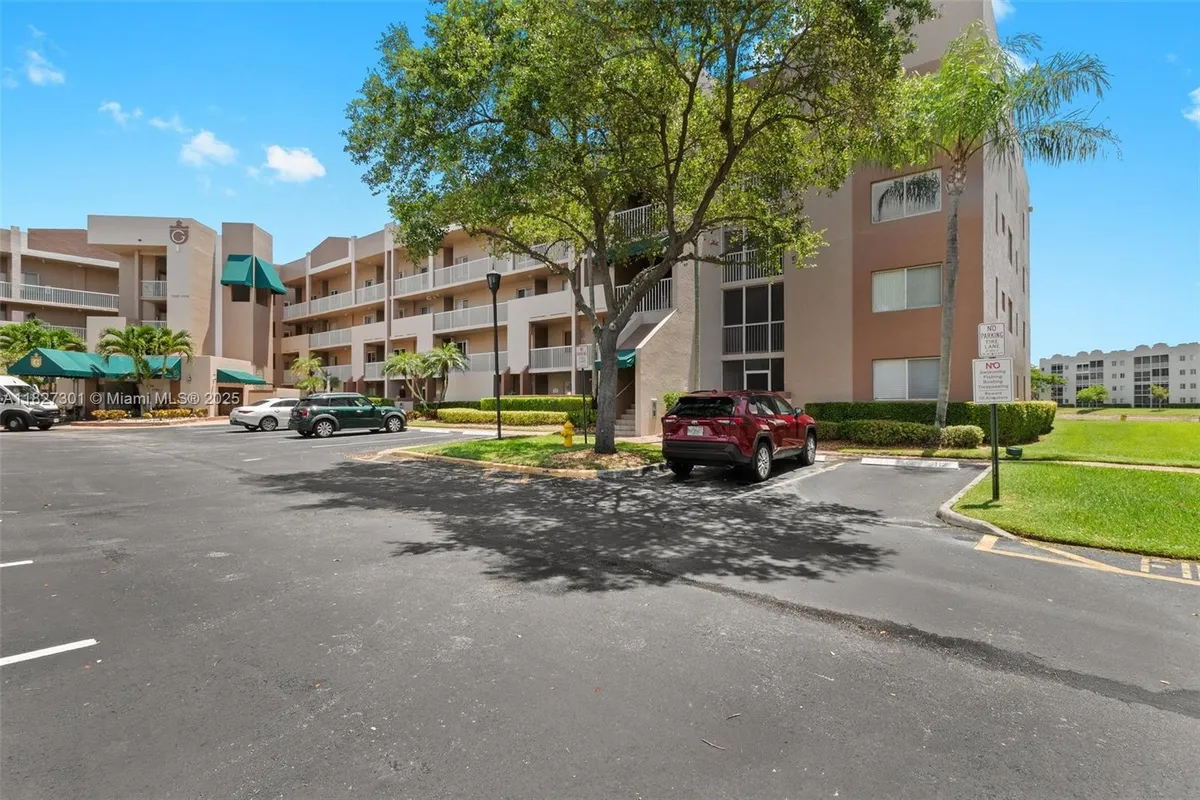 Property Slideshow image 1 of 25 | 7592 granville dr 411, Tamarac, FL, 33321