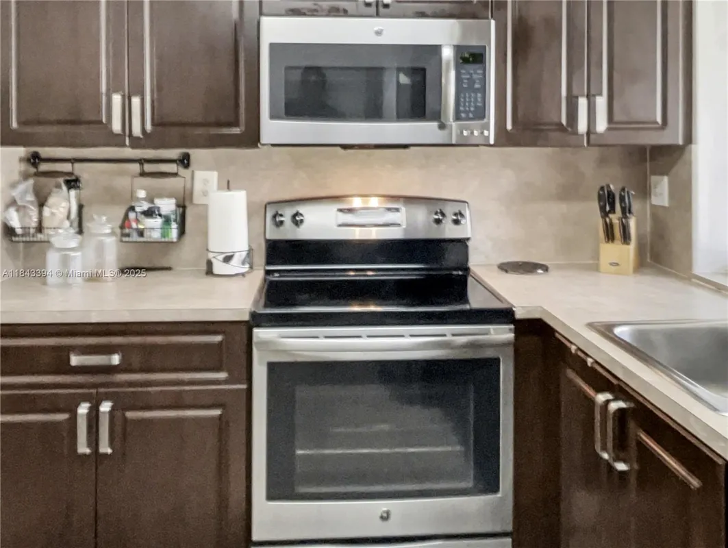 Property Slideshow image 1 of 21 | 9301 lime bay blvd apt 105, Tamarac, FL, 33321