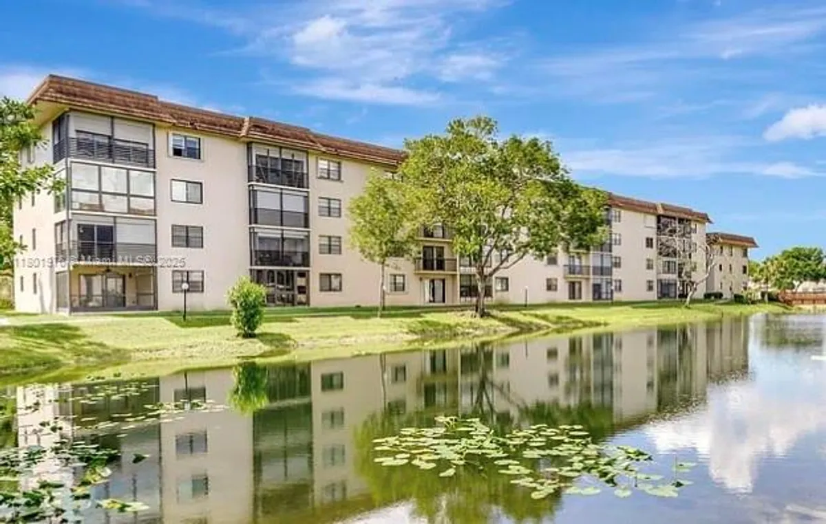 Property Slideshow image 1 of 13 | 4940 e sabal palm blvd 312, Tamarac, FL, 33319