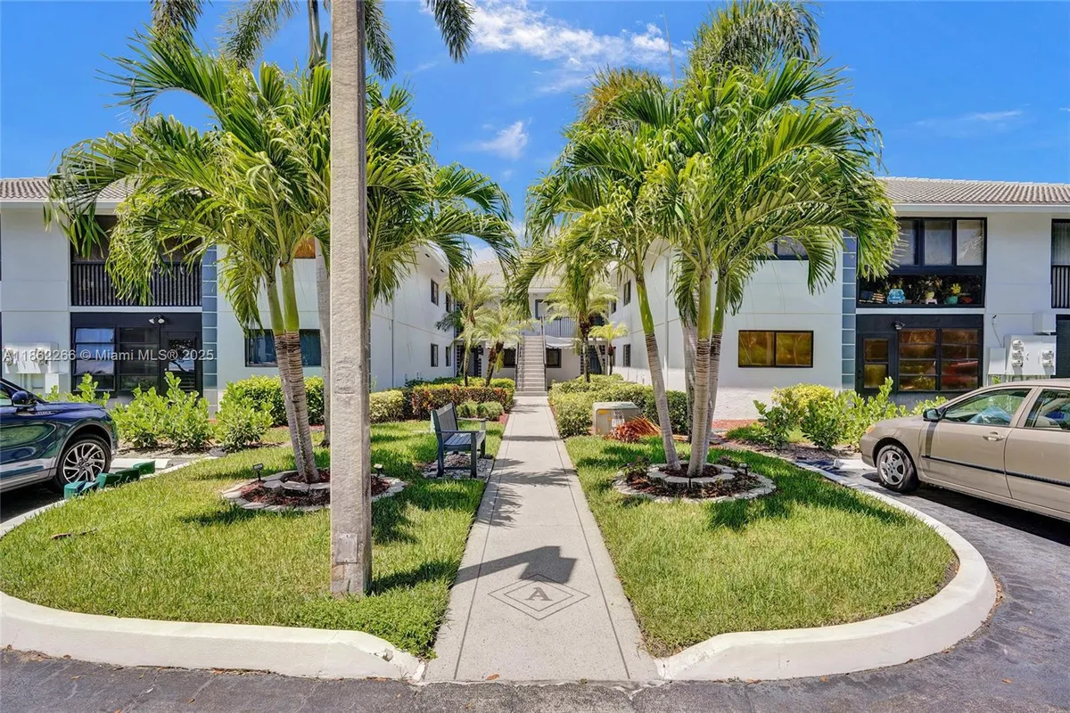 Property Slideshow image 1 of 49 | 15011 ashland cir 27, Delray Beach, FL, 33484