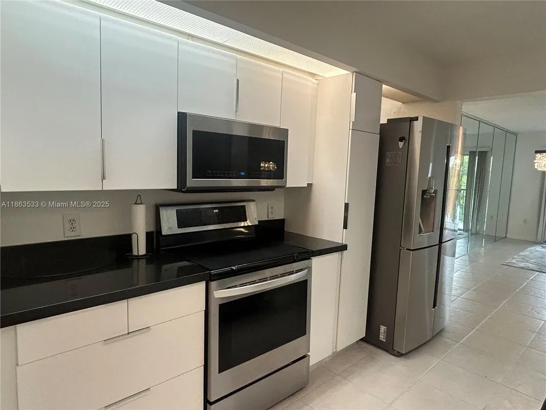 Property Slideshow image 1 of 11 | 901 sw 141st ave 409m, Pembroke Pines, FL, 33027