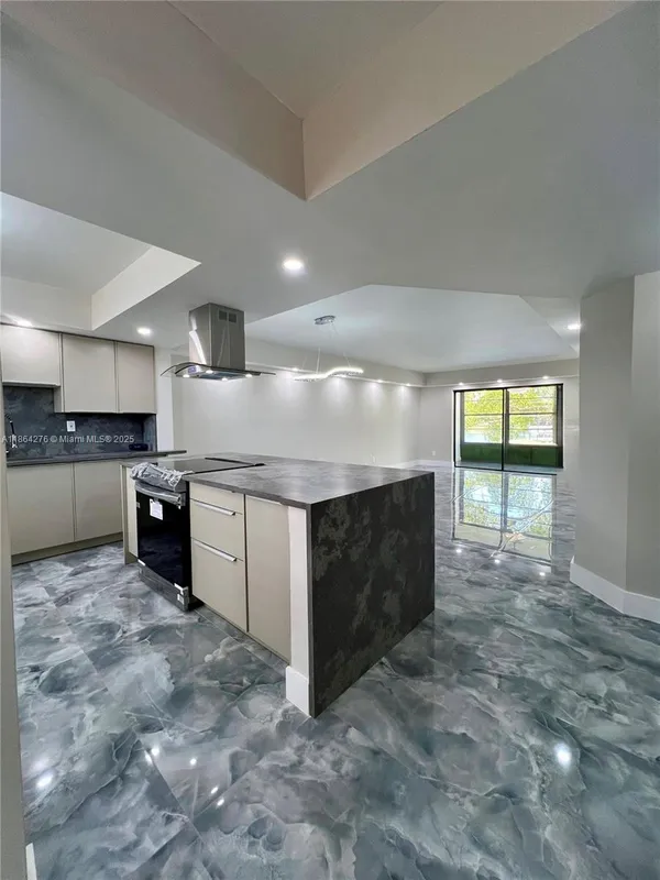 Property Slideshow image 1 of 31 | 4930 e sabal palm blvd 206, Tamarac, FL, 33319