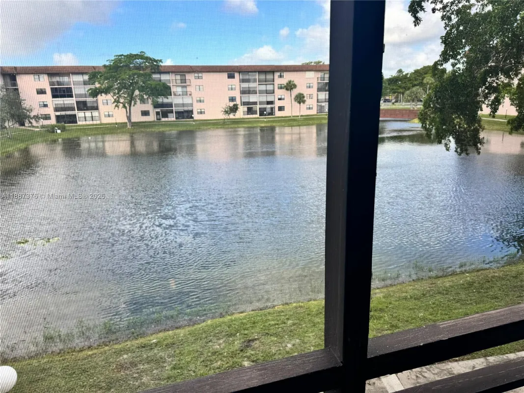 Property Slideshow image 1 of 17 | 4960 e sabal palm blvd apt 203, Tamarac, FL, 33319