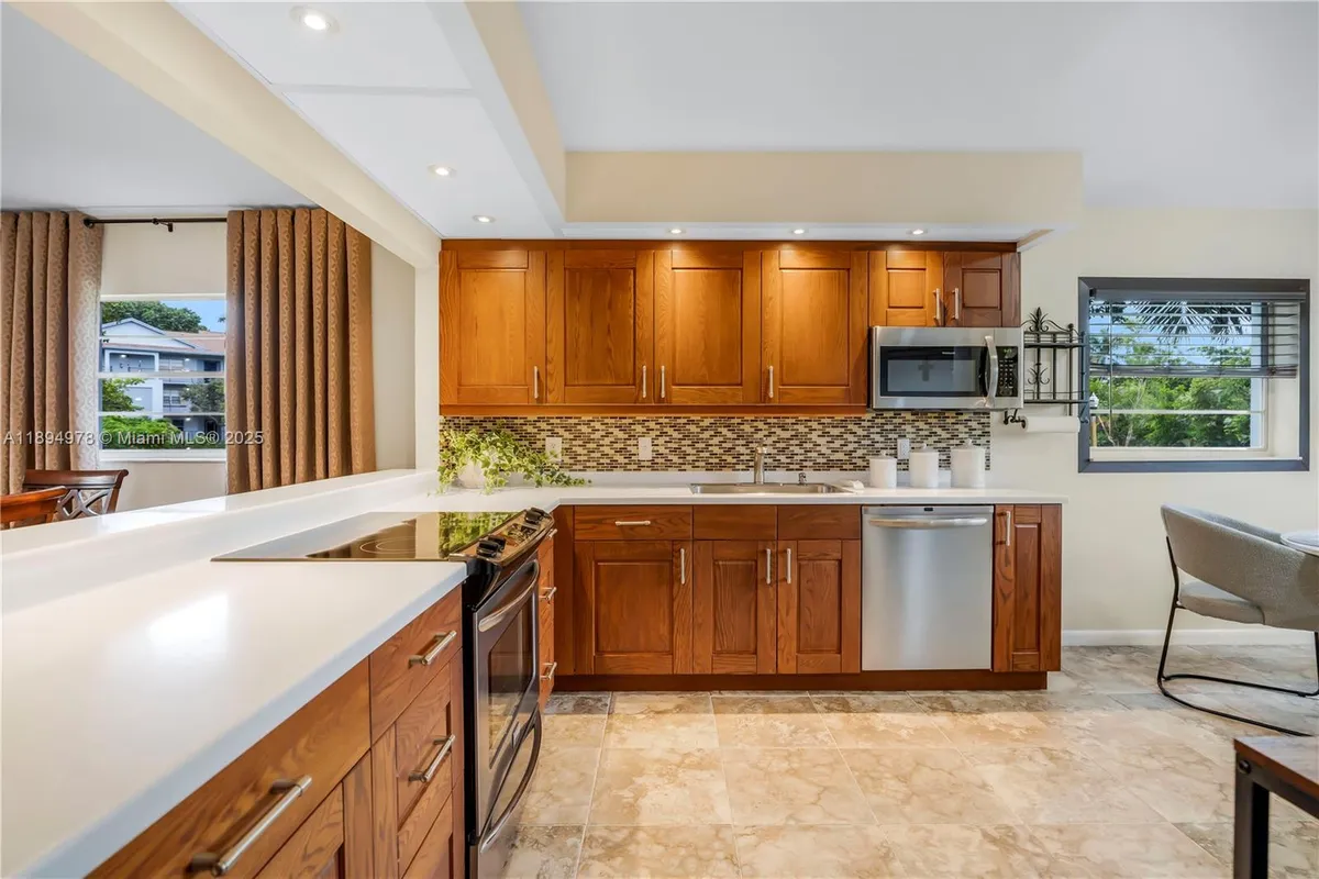 Property Slideshow image 1 of 36 | 12600 sw 5th ct apt 215l, Pembroke Pines, FL, 33027