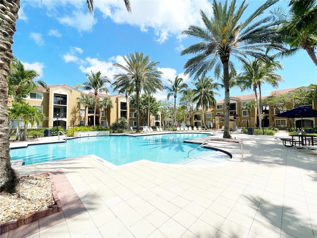 Property Slideshow image 1 of 35 | 8010 n nob hill rd apt 102, Tamarac, FL, 33321