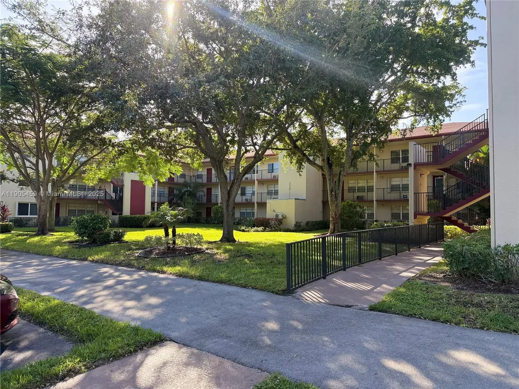 Property Slideshow image 1 of 17 | 13300 sw 1st st apt 109o, Pembroke Pines, FL, 33027