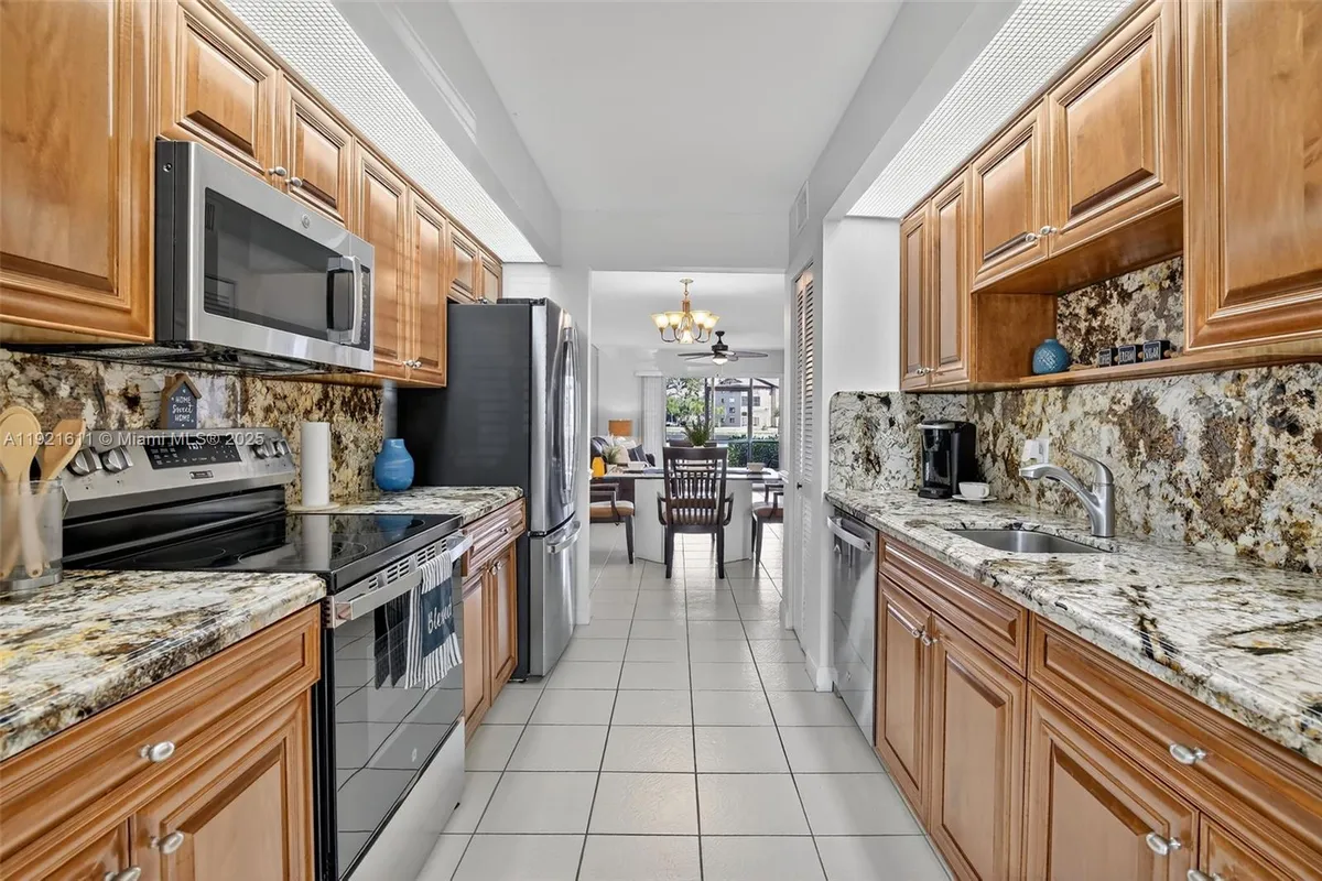 Property Slideshow image 1 of 59 | 13705 sw 12th st 103b, Pembroke Pines, FL, 33027
